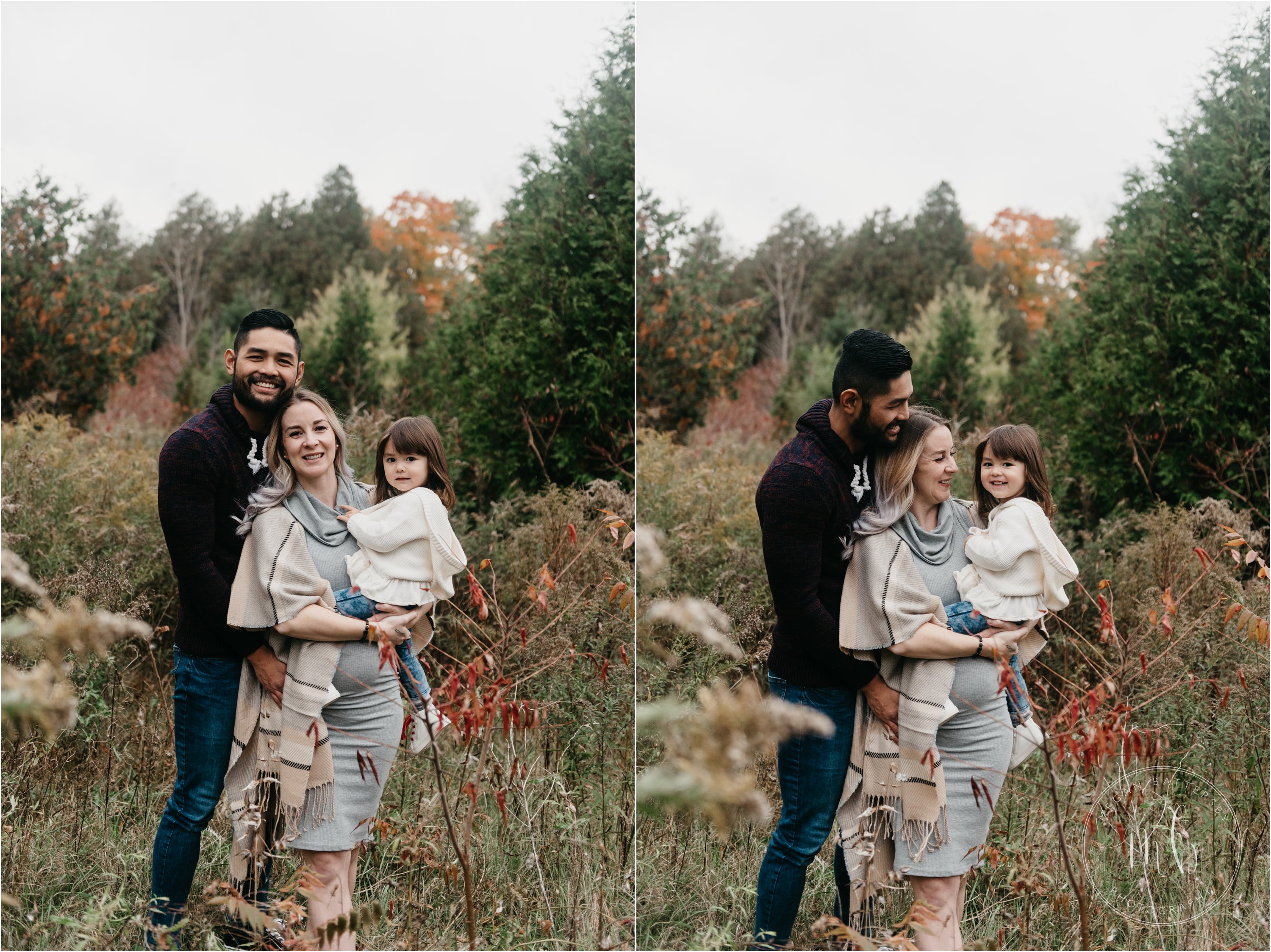 Family posing in fall trees